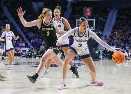 Mar 24, 2024; Manhattan, Kansas, USA; Kansas State Wildcats guard Jaelyn Glenn (3) dribbles against Colorado Buffaloes guard Frida Formann (3) during the first quarter at Bramlage Coliseum. Mandatory Credit: Scott Sewell-USA TODAY Sports