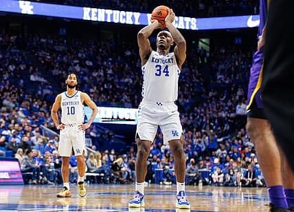 Feb 23, 2022; Lexington, Kentucky, USA; Kentucky Wildcats forward Oscar Tshiebwe (34) shoots a free throw during the second half against the LSU Tigers at Rupp Arena at Central Bank Center. Mandatory Credit: Jordan Prather-USA TODAY Sports