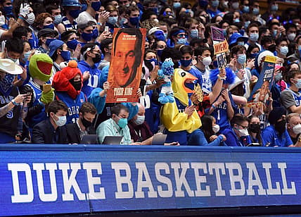 Jan 25, 2022; Durham, North Carolina, USA; Duke Blue Devils fans hold up signs during the first half against the Clemson Tigers at Cameron Indoor Stadium. Mandatory Credit: Rob Kinnan-USA TODAY Sports