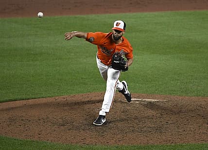 Jul 23, 2022; Baltimore, Maryland, USA;  Baltimore Orioles relief pitcher Jorge Lopez (48) delivers against the New York Yankees in the ninth inning at Oriole Park at Camden Yards. Mandatory Credit: James A. Pittman-USA TODAY Sports