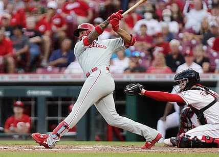Aug 15, 2022; Cincinnati, Ohio, USA; Philadelphia Phillies third baseman Edmundo Sosa (33) hits a two-run single against the Cincinnati Reds during the third inning at Great American Ball Park. Mandatory Credit: David Kohl-USA TODAY Sports