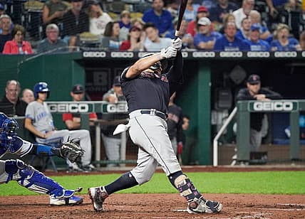 Sep 5, 2022; Kansas City, Missouri, USA; Cleveland Guardians first baseman Josh Naylor (22) hits a solo home run against the Kansas City Royals in the sixth inning at Kauffman Stadium. Mandatory Credit: Denny Medley-USA TODAY Sports