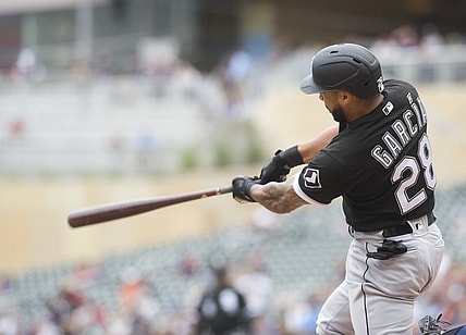 Jul 7, 2021; Minneapolis, Minnesota, USA; Chicago White Sox second baseman Leury Garcia (28) hits a two-run home run during the second inning against the Minnesota Twins at Target Field. Mandatory Credit: Marilyn Indahl-USA TODAY Sports