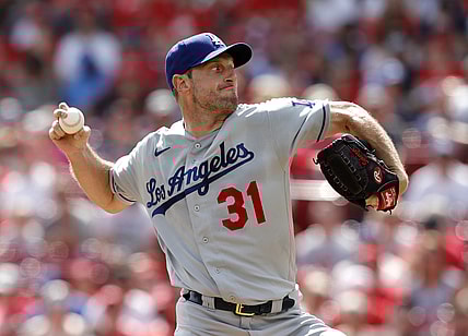 Sep 18, 2021; Cincinnati, Ohio, USA; Los Angeles Dodgers starting pitcher Max Scherzer (31) throws a pitch against the Cincinnati Reds during the first inning at Great American Ball Park. Mandatory Credit: David Kohl-USA TODAY Sports