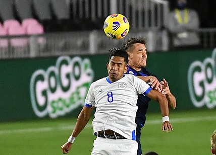 Dec 9, 2020; Fort Lauderdale, Florida, USA; El Salvador midfielder Denis Pineda (8) heads the ball against the United States during the first half at Inter Miami CF Stadium. Mandatory Credit: Jasen Vinlove-USA TODAY Sports