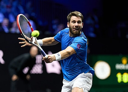 Sep 24, 2022; London, United Kingdom;Cameron Norrie (GBR) plays a shot against Taylor Fritz (USA) in a Laver Cup singles match.  Mandatory Credit: Peter van den Berg-USA TODAY Sports