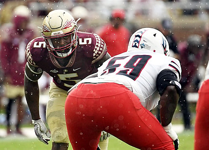 Aug 27, 2022; Tallahassee, Florida, USA; Florida State Seminoles defensive end Jared Verse (5) lines up against  Duquesne Dukes offensive lineman Chris Oliver (59) during the first half at Doak S. Campbell Stadium. Mandatory Credit: Melina Myers-USA TODAY Sports