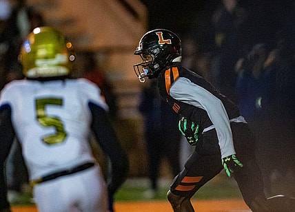 Lakeland (7) Cormani McClain runs back an interception against Osceola during first half action in Lakeland Fl  Friday December 2,2022.Ernst Peters/The Ledger

120222 Ep Preps 9 News