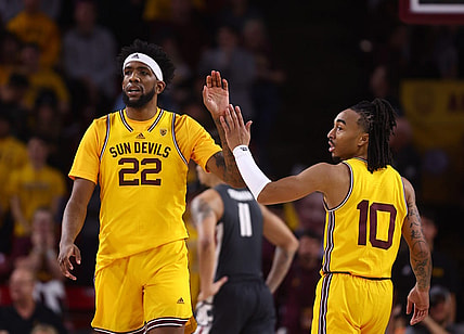 Jan 5, 2023; Tempe, Arizona, USA; Arizona State Sun Devils forward Warren Washington (22) celebrates with guard Frankie Collins (10) against the Washington State Cougars in the second half at Desert Financial Arena. Mandatory Credit: Mark J. Rebilas-USA TODAY Sports