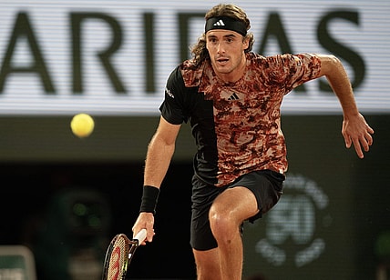 Jun 6 2023; Paris, France; Stefanos Tsitsipas (GRE) runs for the ball during a match against Carlos Alcaraz (ESP) on day 10 at Stade Roland-Garros. Mandatory Credit: Susan Mullane-USA TODAY Sports