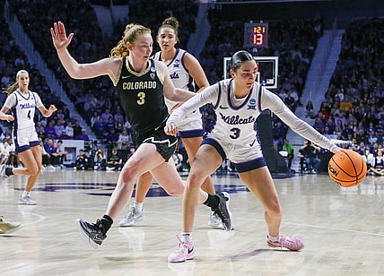 Mar 24, 2024; Manhattan, Kansas, USA; Kansas State Wildcats guard Jaelyn Glenn (3) dribbles against Colorado Buffaloes guard Frida Formann (3) during the first quarter at Bramlage Coliseum. Mandatory Credit: Scott Sewell-USA TODAY Sports