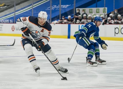 May 4, 2021; Vancouver, British Columbia, CAN; Edmonton Oilers forward Leon Draisaitl (29) skates against the Vancouver Canucks  in the second period at Rogers Arena. Mandatory Credit: Bob Frid-USA TODAY Sports