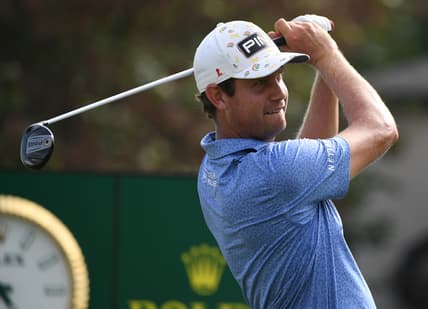 Aug 7, 2021; Memphis, Tennessee, USA; Harris English watches his tee shot on the 18th hole during the third round of the WGC FedEx St. Jude Invitational golf tournament at TPC Southwind. Mandatory Credit: Christopher Hanewinckel-USA TODAY Sports