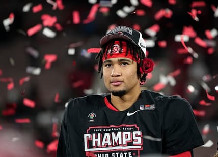Ohio State Buckeyes quarterback C.J. Stroud (7) wears a rose behind his ear following the 48-45 win over the Utah Utes in the Rose Bowl in Pasadena, Calif. on Jan. 1, 2022.

College Football Rose Bowl