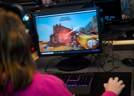 Spring Grove High School esports player Cali Schmidt plays as Roadhog in Overwatch during a practice on Thursday, February, 27, 2020.