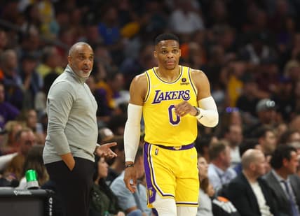 Apr 5, 2022; Phoenix, Arizona, USA; Los Angeles Lakers guard Russell Westbrook and assistant coach Phil Handy against the Phoenix Suns at Footprint Center. Mandatory Credit: Mark J. Rebilas-USA TODAY Sports