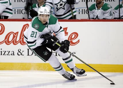Dec 12, 2022; Pittsburgh, Pennsylvania, USA; Dallas Stars left wing Jason Robertson (21) skates with the puck against the Pittsburgh Penguins during the third period at PPG Paints Arena. The Penguins won 2-1. Mandatory Credit: Charles LeClaire-USA TODAY Sports