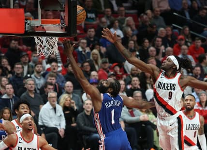 Jan 19, 2023; Portland, Oregon, USA;  Philadelphia 76ers guard James Harden (1) shoots the ball over Portland Trail Blazers forward Jerami Grant (9) in the first half at Moda Center. Mandatory Credit: Jaime Valdez-USA TODAY Sports