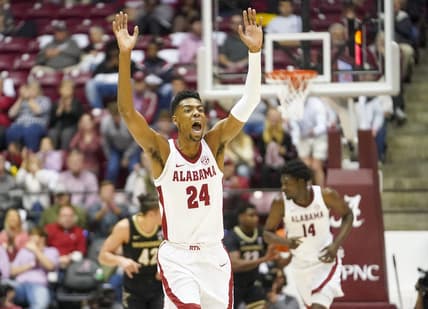 Jan 31, 2023; Tuscaloosa, Alabama, USA; Alabama Crimson Tide forward Brandon Miller (24) reacts after hitting a three pointer against the Vanderbilt Commodores during the first half at Coleman Coliseum. Mandatory Credit: Marvin Gentry-USA TODAY Sports