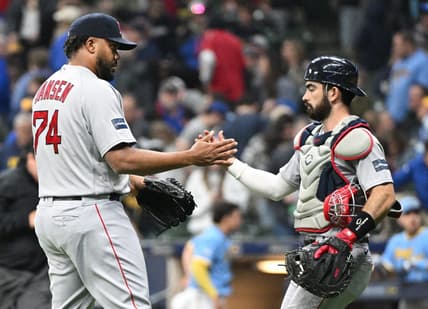 Apr 21, 2023; Milwaukee, Wisconsin, USA; Boston Red Sox relief pitcher Kenley Jansen (74) and catcher Connor Wong (12) celebrate a 5-3 win over the Milwaukee Brewers at American Family Field. Mandatory Credit: Michael McLoone-USA TODAY Sports