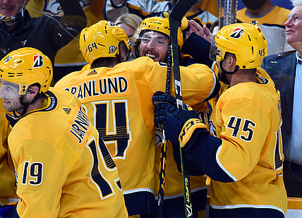 May 21, 2021; Nashville, Tennessee, USA; Nashville Predators center Matt Duchene (95) celebrates with teammates after scoring the game-winning goal in the second overtime against the Carolina Hurricanes in game three of the first round of the 2021 Stanley Cup Playoffs at Bridgestone Arena. Mandatory Credit: Christopher Hanewinckel-USA TODAY Sports