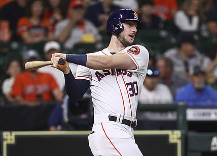 Jun 1, 2021; Houston, Texas, USA; Houston Astros right fielder Kyle Tucker (30) hits a double during the second inning against the Boston Red Sox at Minute Maid Park. Mandatory Credit: Troy Taormina-USA TODAY Sports
