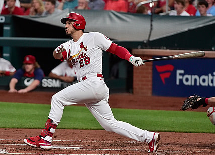 Jun 9, 2021; St. Louis, Missouri, USA;  St. Louis Cardinals third baseman Nolan Arenado (28) hits a double during the third inning against the Cleveland Indians at Busch Stadium. Mandatory Credit: Jeff Curry-USA TODAY Sports