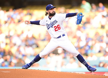 Jul 24, 2021; Los Angeles, California, USA; Los Angeles Dodgers starting pitcher Tony Gonsolin (26) throws against the Colorado Rockies during the first inning at Dodger Stadium. Mandatory Credit: Gary A. Vasquez-USA TODAY Sports