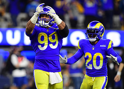 Jan 30, 2022; Inglewood, California, USA; Los Angeles Rams defensive end Aaron Donald (99) celebrates in the fourth quarter during the NFC Championship Game against the San Francisco 49ers at SoFi Stadium. Mandatory Credit: Gary A. Vasquez-USA TODAY Sports
