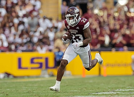 Sep 17, 2022; Baton Rouge, Louisiana, USA;  Mississippi State Bulldogs running back Dillon Johnson (23) rushes against the LSU Tigers during the first half at Tiger Stadium. Mandatory Credit: Stephen Lew-USA TODAY Sports