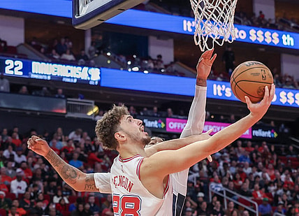 Dec 22, 2023; Houston, Texas, USA; Houston Rockets center Alperen Sengun (28) scores against Dallas Mavericks forward Markieff Morris (88) in the second quarter at Toyota Center. Mandatory Credit: Thomas Shea-USA TODAY Sports