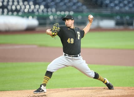 Pirates pitcher Derek Holland was ejected
