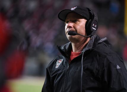 Nov 16, 2019; Raleigh, NC, USA; North Carolina State Wolfpack head coach Dave Doeren watches a replay during the second half against the Louisville Cardinals at Carter-Finley Stadium. Mandatory Credit: Rob Kinnan-USA TODAY Sports