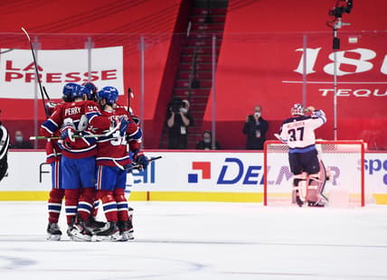 Jun 6, 2021; Montreal, Quebec, CAN; Montreal Canadiens forward Corey Perry (94) reacts with teammates after scoring a goal against Winnipeg Jets goalie Connor Hellebuyck (37) during the first period in game three of the second round of the 2021 Stanley Cup Playoffs at the Bell Centre. Mandatory Credit: Eric Bolte-USA TODAY Sports