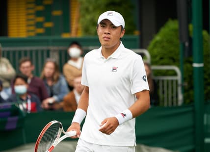 Jun 29, 2021; London, United Kingdom; Brandon Nakashima  (USA) seen on court against compatriot  Taylor Fritz (USA) in first round  singles on No. 16 court at All England Lawn Tennis and Croquet Club. Fritz ran out the winner 7-5  3-6  6-6  7-5.  Mandatory Credit: Peter van den Berg-USA TODAY Sports