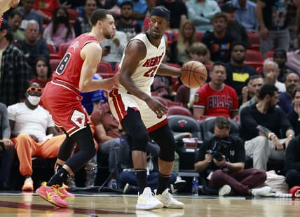 Feb 28, 2022; Miami, Florida, USA;  Chicago Bulls guard Zach LaVine (8) defends Miami Heat forward Jimmy Butler (22) at FTX Arena. Mandatory Credit: Rhona Wise-USA TODAY Sports