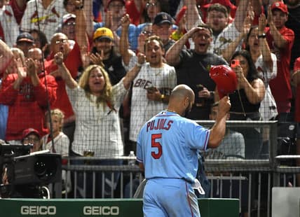 Sep 10, 2022; Pittsburgh, Pennsylvania, USA;  St. Louis Cardinals  Albert Pujols (5) tips his helmet to the crowd after leaving the game against the Pittsburgh Pirates in the eighth inning at PNC Park. Mandatory Credit: Philip G. Pavely-USA TODAY Sports