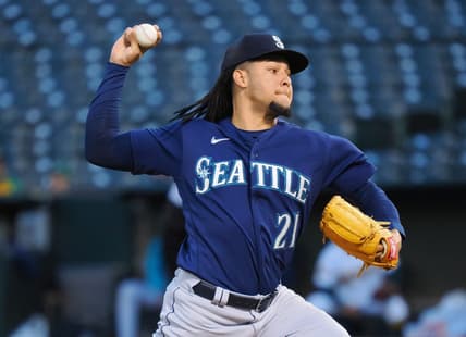 Sep 20, 2022; Oakland, California, USA; Seattle Mariners starting pitcher Luis Castillo (21) pitches the ball against the Oakland Athletics during the first inning at RingCentral Coliseum. Mandatory Credit: Kelley L Cox-USA TODAY Sports