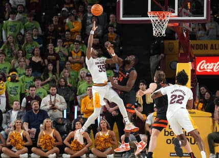 Feb 2, 2023; Tempe, Arizona, USA; Arizona State Sun Devils guard Devan Cambridge (35) shoots over Oregon State Beavers forward Rodrigue Andela (34) during the first half at Desert Financial Arena. Mandatory Credit: Joe Camporeale-USA TODAY Sports