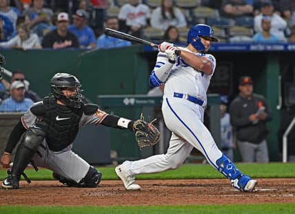 May 3, 2023; Kansas City, Missouri, USA;  Kansas City Royals designated hitter Vinnie Pasquantino (9) hits an RBI double during the seventh inning against the Baltimore Orioles at Kauffman Stadium. Mandatory Credit: Peter Aiken-USA TODAY Sports