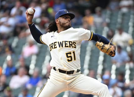 Aug 7, 2023; Milwaukee, Wisconsin, USA; Milwaukee Brewers starting pitcher Freddy Peralta (51) delivers a pitch against the Colorado Rockies in the first inning at American Family Field. Mandatory Credit: Michael McLoone-USA TODAY Sports