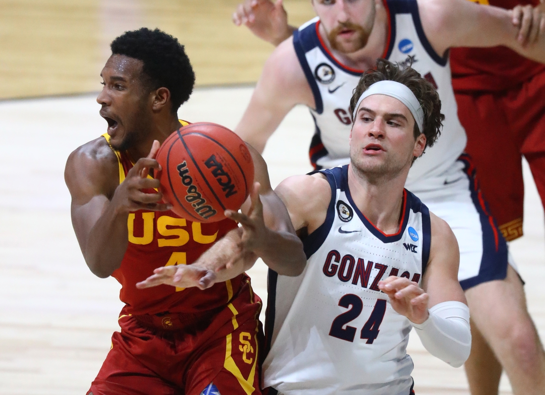 Mar 30, 2021; Indianapolis, IN, USA; Gonzaga Bulldogs forward Corey Kispert (24) against Southern California Trojans forward Evan Mobley (4) during the Elite Eight of the 2021 NCAA Tournament at Lucas Oil Stadium. Mandatory Credit: Mark J. Rebilas-USA TODAY Sports