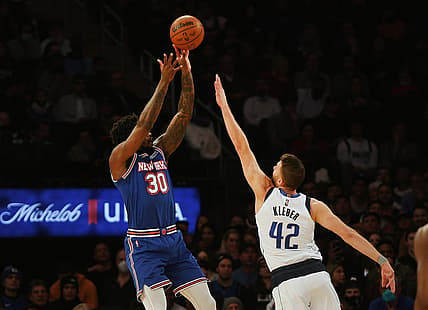 Jan 12, 2022; New York, New York, USA; New York Knicks forward Julius Randle (30) takes a shot while being defended by Dallas Mavericks forward Maxi Kleber (42) during the first half at Madison Square Garden. Mandatory Credit: Andy Marlin-USA TODAY Sports