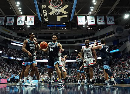 Feb 22, 2022; Hartford, Connecticut, USA; Connecticut Huskies guard R.J. Cole (2) reacts after his go ahead basket in the last seconds of play against the Villanova Wildcats in the second half at XL Center. Mandatory Credit: David Butler II-USA TODAY Sports