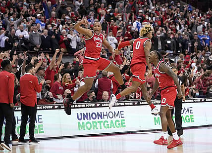 Ohio State Buckeyes forward Zed Key (23) celebrates with guard Meechie Johnson Jr. (0) and guard Cedric Russell (2) following their 71-66 win over the Duke Blue Devils in the NCAA men's basketball game at Value City Arena in Columbus on Wednesday, Dec. 1, 2021.

Duke At Ohio State Big Ten Acc Challenge