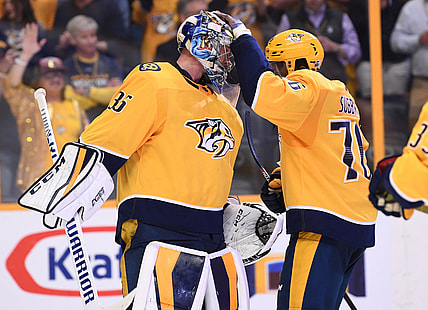 Apr 12, 2018; Nashville, TN, USA; Nashville Predators goalie Pekka Rinne (35) is congratulated by Nashville Predators defenseman P.K. Subban (76) after a win against the Colorado Avalanche in game one of the first round of the 2018 Stanley Cup Playoffs at Bridgestone Arena. Mandatory Credit: Christopher Hanewinckel-USA TODAY Sports