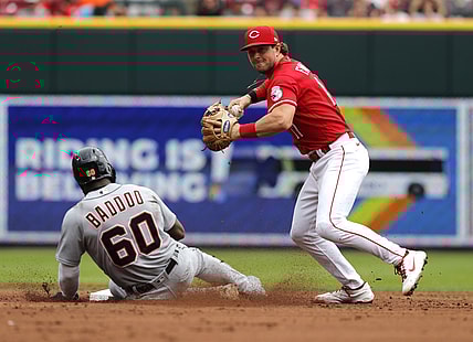 Sep 5, 2021; Cincinnati, Ohio, USA; Detroit Tigers center fielder Akil Baddoo (60) is forced out at second base against Cincinnati Reds shortstop Kyle Farmer (17) during the third inning at Great American Ball Park. Mandatory Credit: David Kohl-USA TODAY Sports