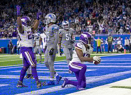 Dec 5, 2021; Detroit, Michigan, USA; Minnesota Vikings wide receiver K.J. Osborn (17) scores a touchdown against the Detroit Lions during the second half at Ford Field. Mandatory Credit: David Reginek-USA TODAY Sports