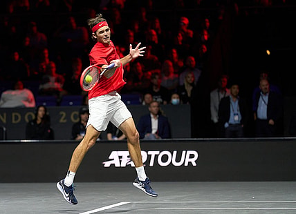 Sep 24, 2022; London, United Kingdom;Taylor Fritz (USA) plays a shot against Cameron Norrie (GBR) in a Laver Cup singles match.  Mandatory Credit: Peter van den Berg-USA TODAY Sports