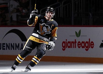 Jan 15, 2024; Pittsburgh, Pennsylvania, USA;  Pittsburgh Penguins center Sidney Crosby (87) reacts after being named a star of the game against the Seattle Kraken at PPG Paints Arena. Mandatory Credit: Charles LeClaire-USA TODAY Sports